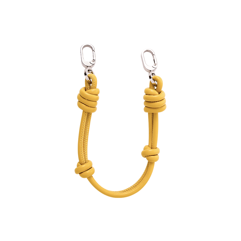 Yellow knot strap phone hand charm with secure attachment ring