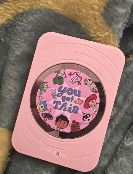 Original real photograph of a pink CaseBang wallet stand with its You got This circular cover.